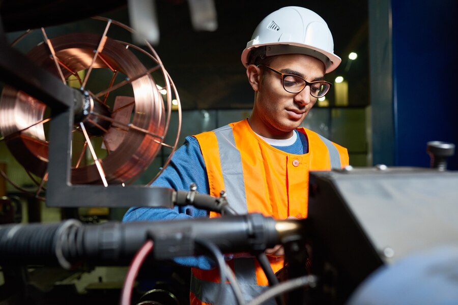 portrait-handsome-machine-operator_236854-8515